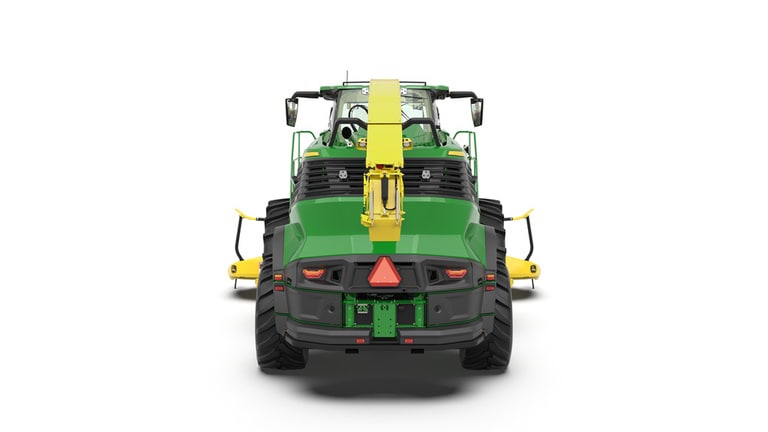 A rear-facing green F8 500 self-propelled forage harvester with a yellow header on a white background.