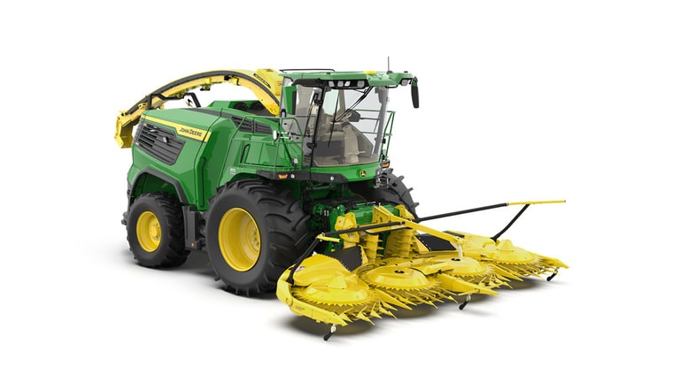 A front-right-facing green F8 600 self-propelled forage harvester with a yellow header on a white background.