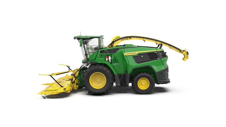 A left-facing green F8 600 self-propelled forage harvester with a yellow header on a white background.