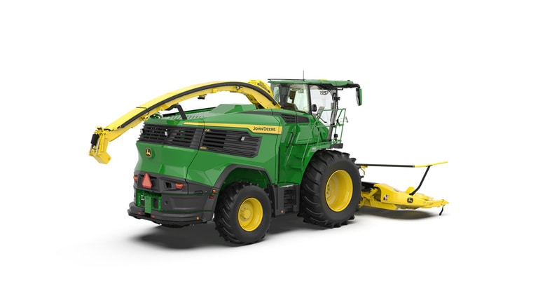 A rear-right-facing green F8 600 self-propelled forage harvester with a yellow header on a white background.