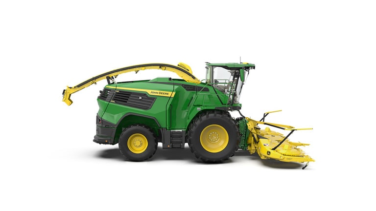 A right-facing green F8 600 self-propelled forage harvester with a yellow header on a white background.