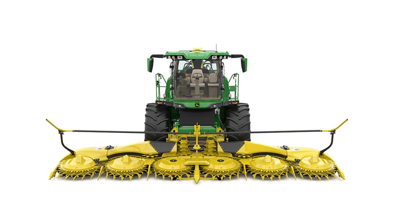 A front-facing green F9 1000 self-propelled forage harvester with a yellow header on a white background.