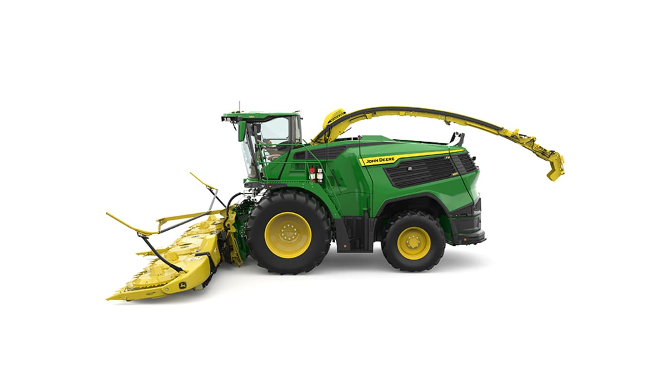 A left-facing green F9 1000 self-propelled forage harvester with a yellow header on a white background.
