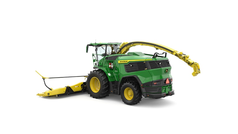 A rear-left-facing green F9 1000 self-propelled forage harvester with a yellow header on a white background.