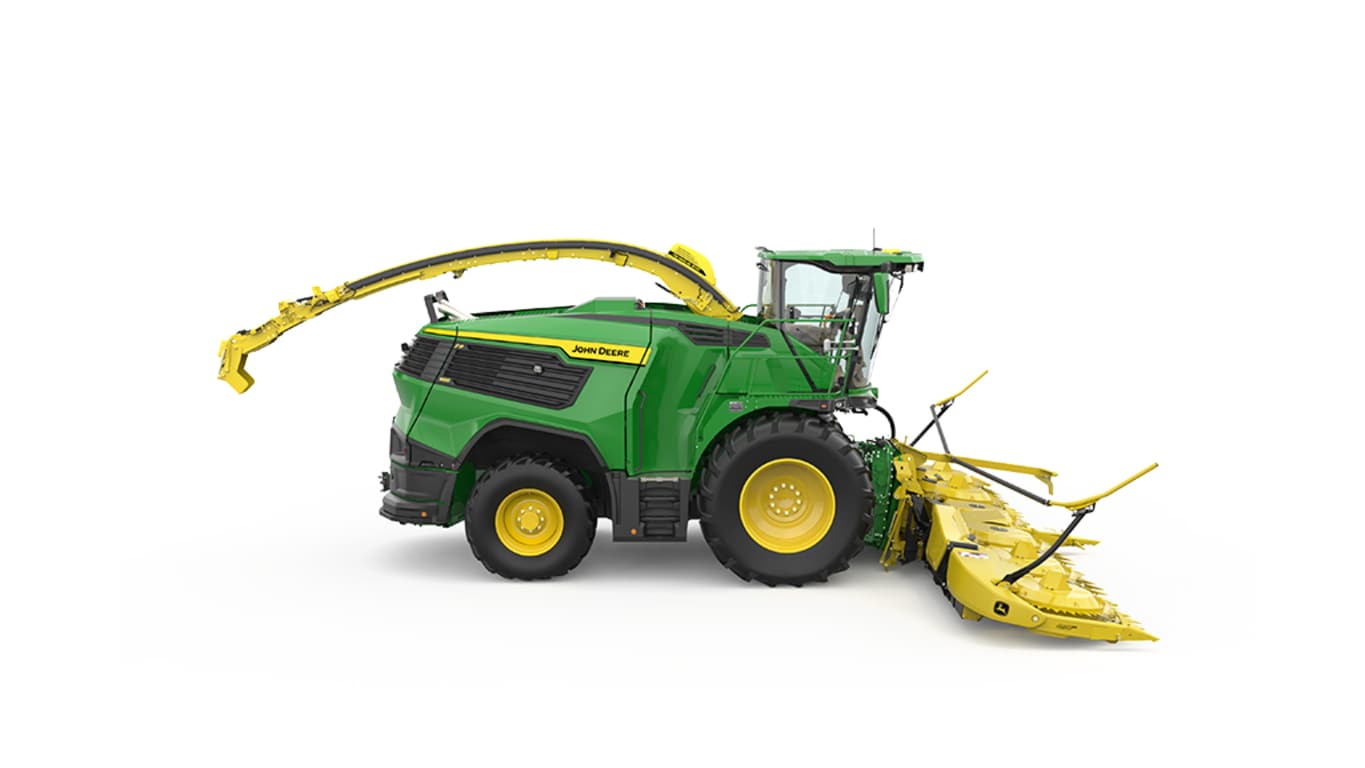 A right-facing green F9 1000 self-propelled forage harvester with a yellow header on a white background.