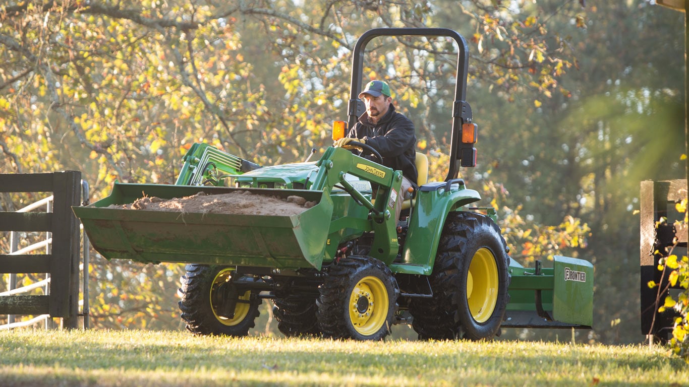 image of tractor with front end loader attached