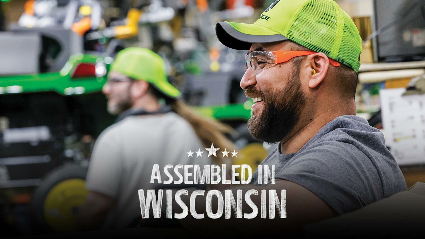 Team members near the assembly line at the John&nbsp;Deere factory in Wisconsin.