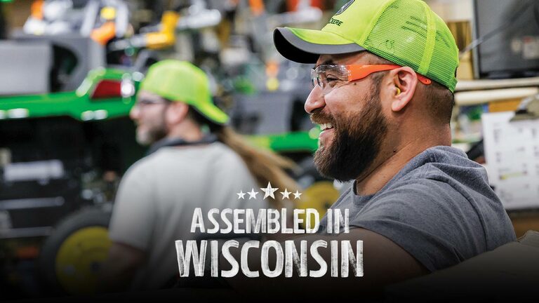 Team members near the assembly line at the John&nbsp;Deere factory in Wisconsin.
