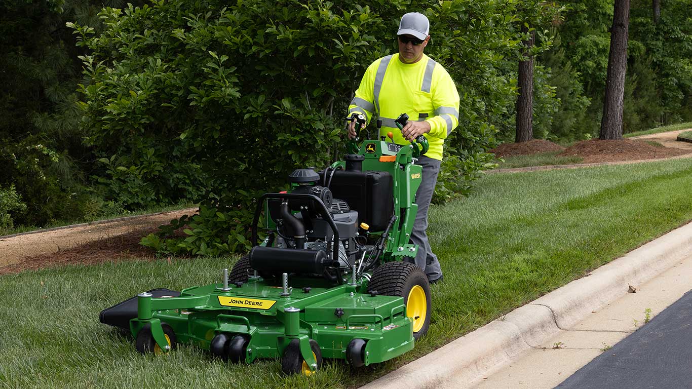 Person mowing lawn on a W84R commercial zero turn mower