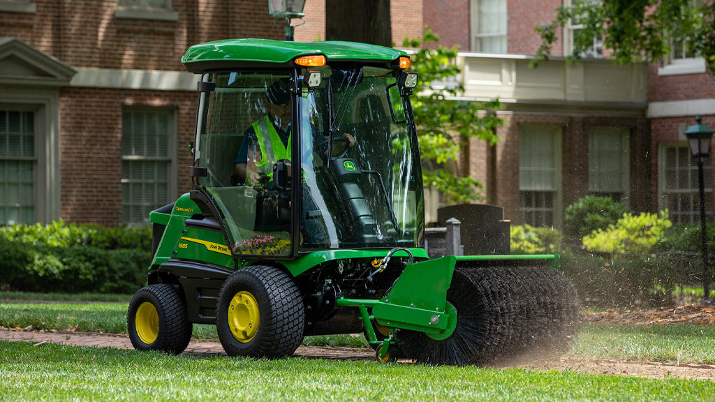 front mower mowing grass