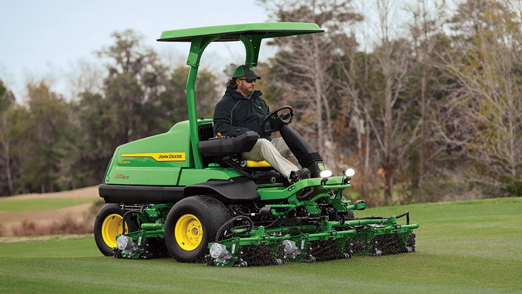 Man mowing a fairway using a 6700A E-Cut Hybrid Fairway Mower