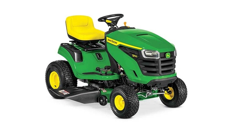A front-right-facing green riding mower with a yellow seat and green mowing deck on a white background.