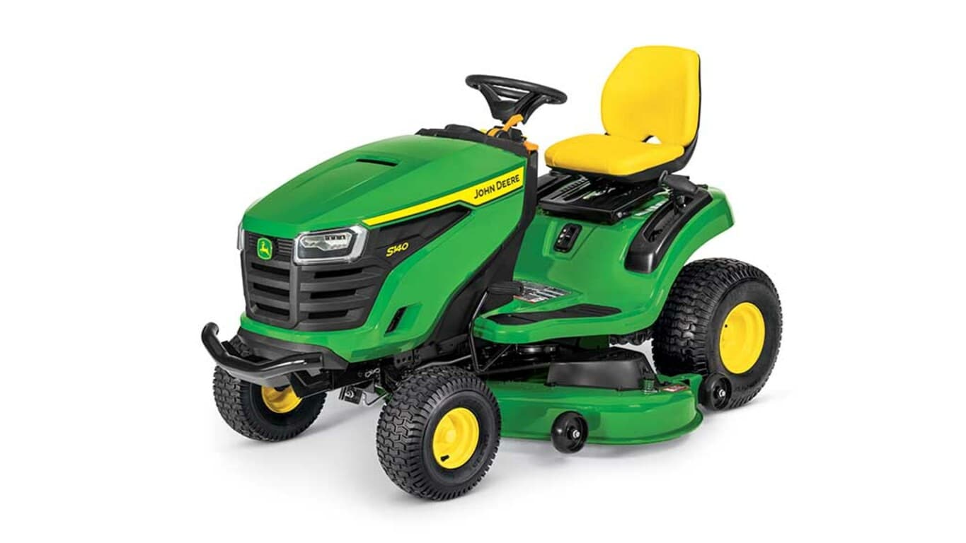 A front-left-facing green riding mower with a yellow seat and green mowing deck on a white background.