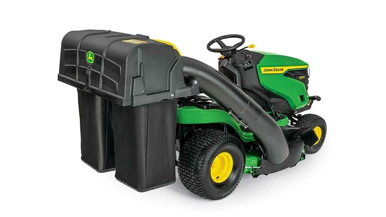 A rear-right-facing green riding mower with a bagging attachment and green 42" mowing deck on a white background.