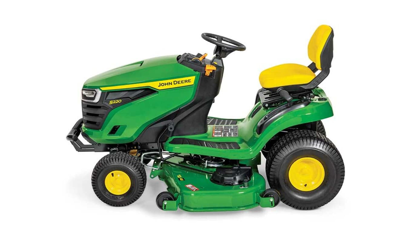 A left-facing green riding mower with a yellow seat and green 48" mowing deck on a white background.