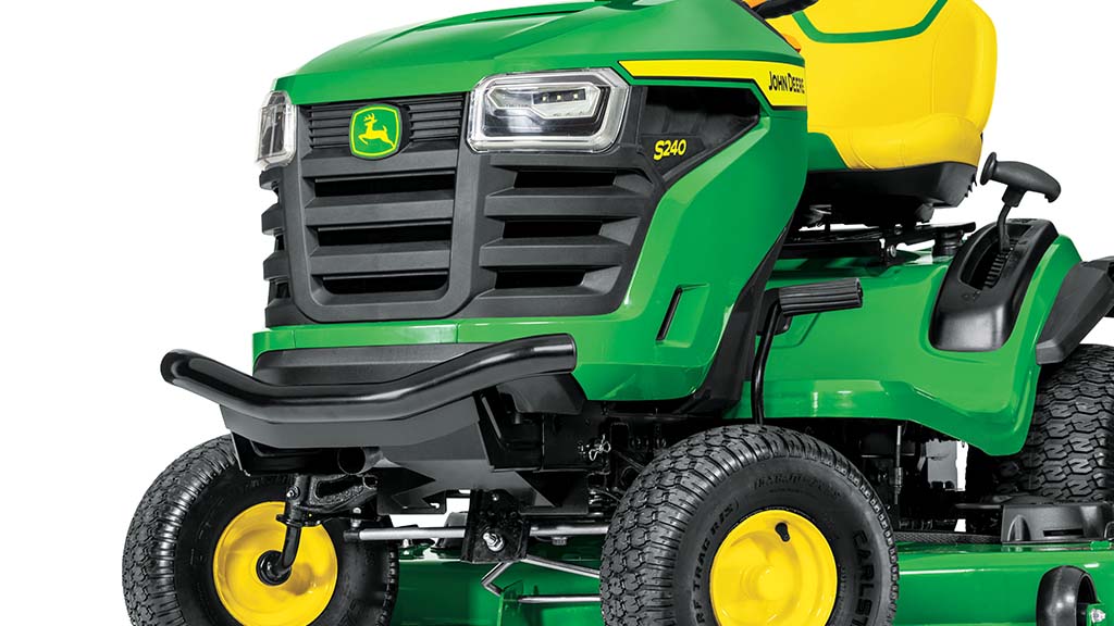 Front-right studio shot of a black bumper on the front of a green riding mower.