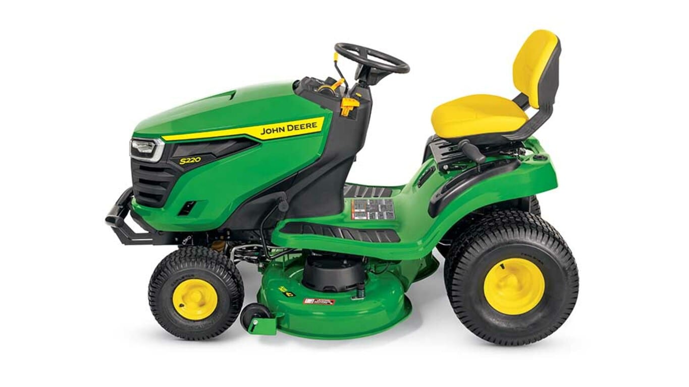 A left-facing green riding mower with a yellow seat and green 42" mowing deck on a white background.