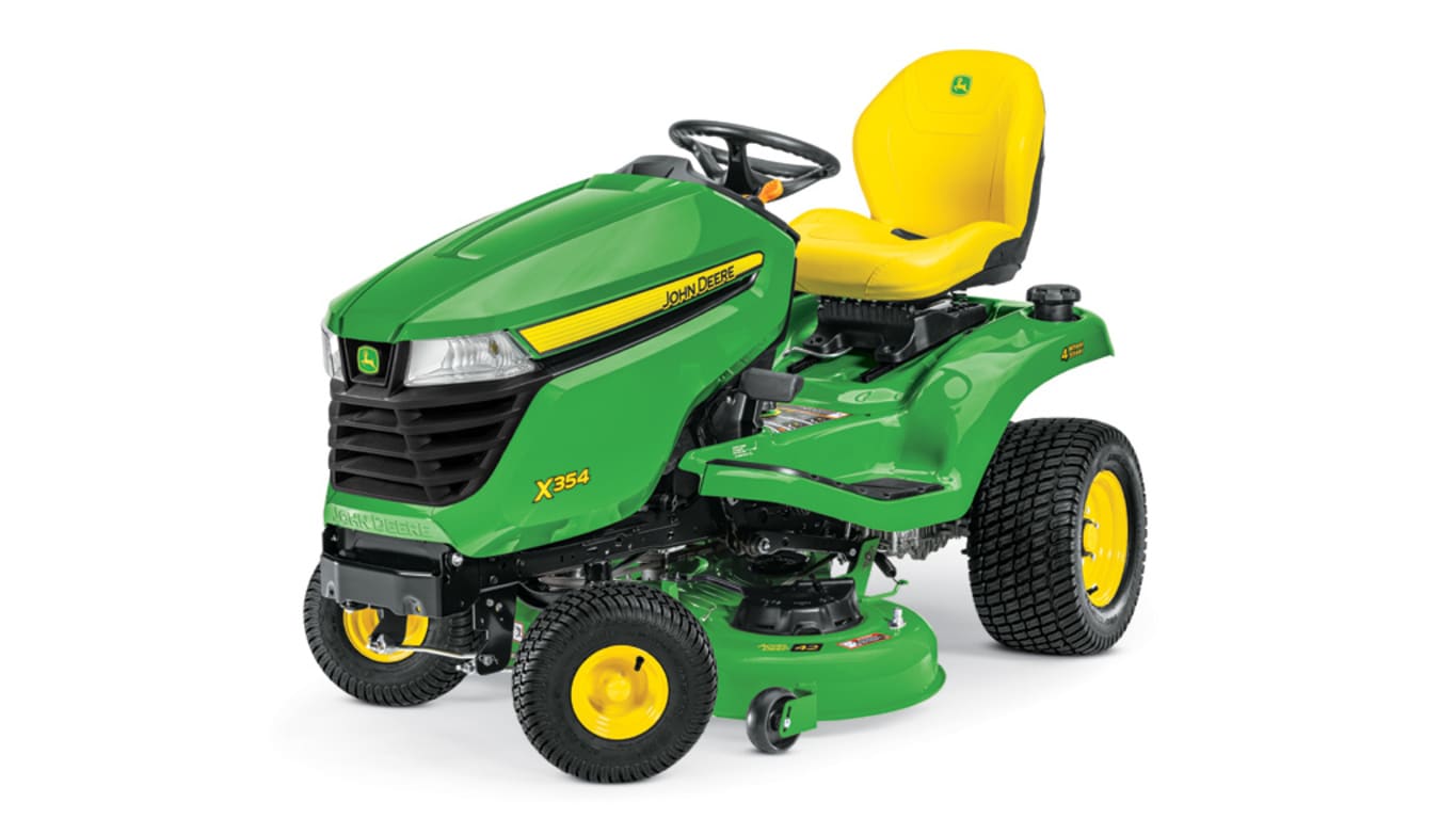 Image of John Deere 325 lawn tractor mowing grass