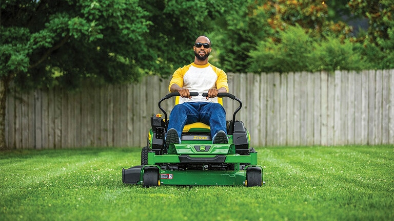 Person riding a Z320M mower