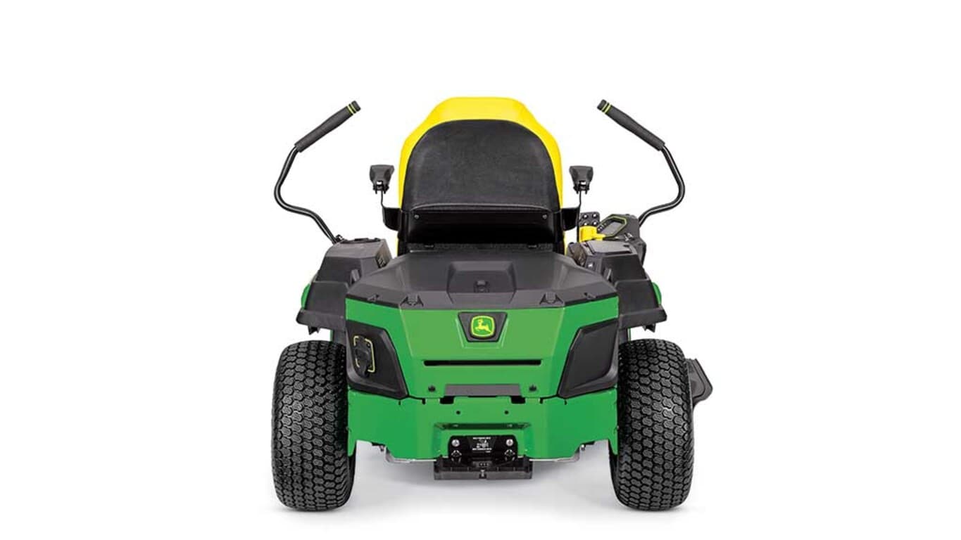 A backward-facing green zero-turn mower with a yellow seat and green mowing deck on a white background.