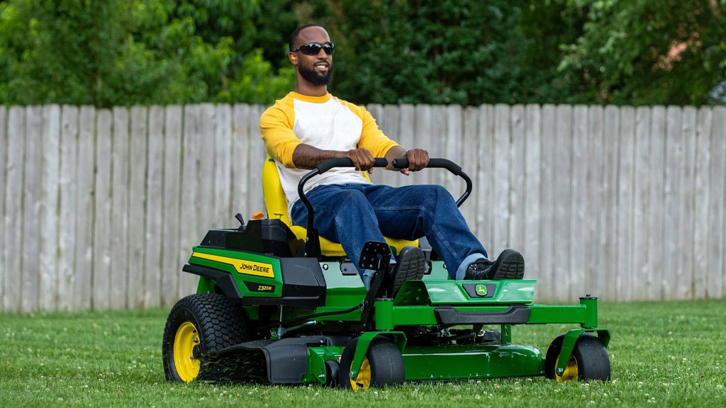 man mowing lawn on a Z330R