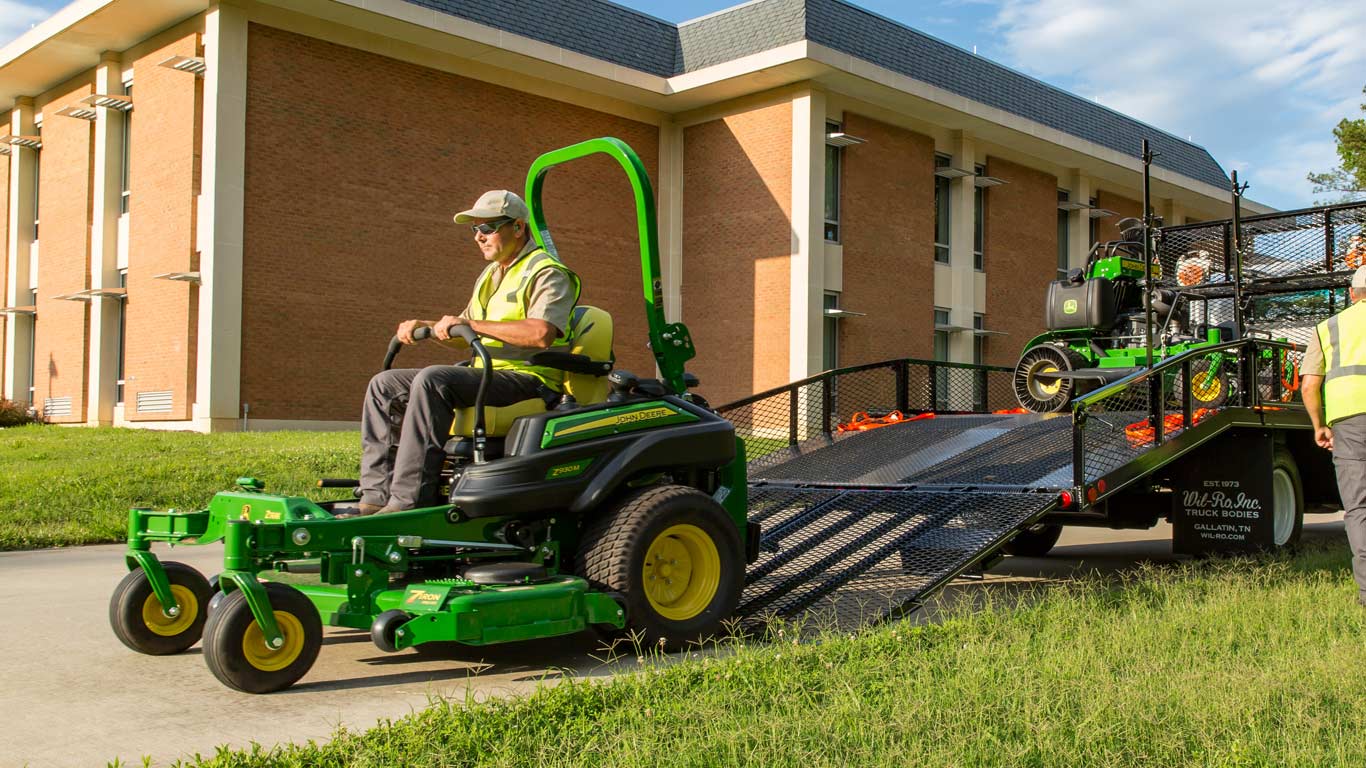 field image of a landscaper on a Z900-Series ztrak mower