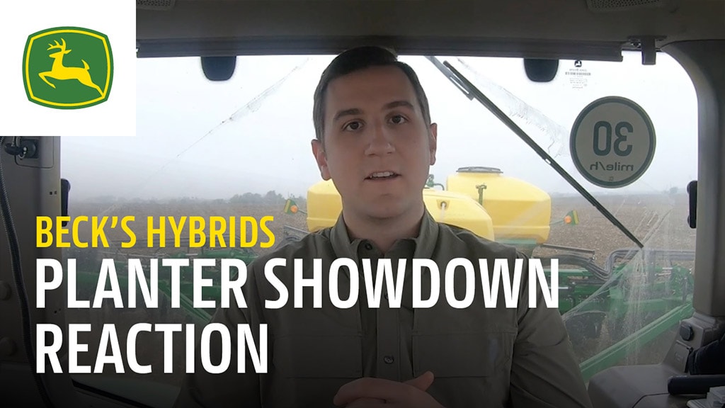 Operator inside a tractor cab.
