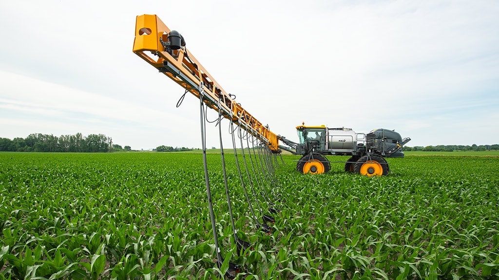 Hagie Sprayer working in corn field.