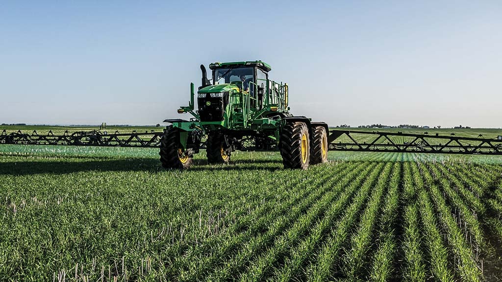 See & Spray Gen 2 412R Sprayer target spraying herbicide in wheat field.