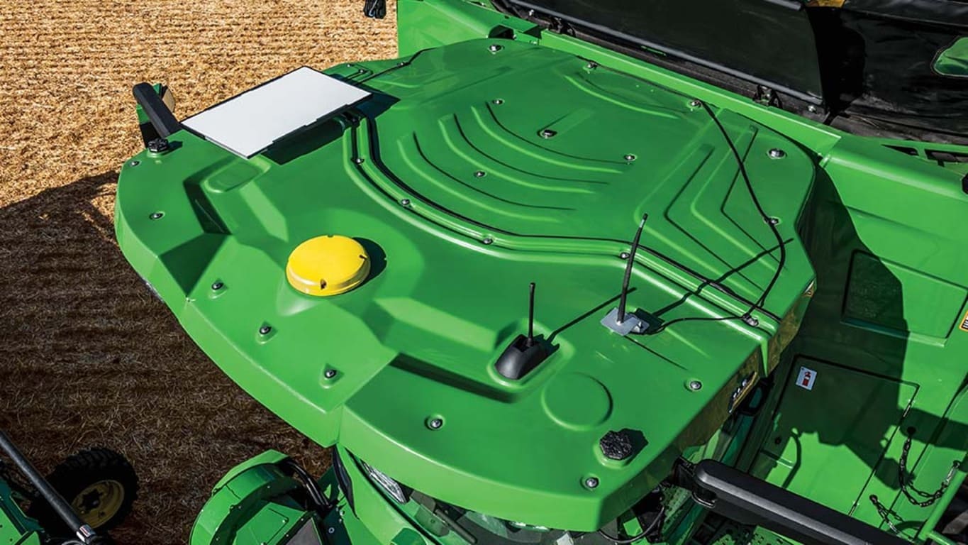 Aerial view of tractor cab roof with JDLink Boost installed.