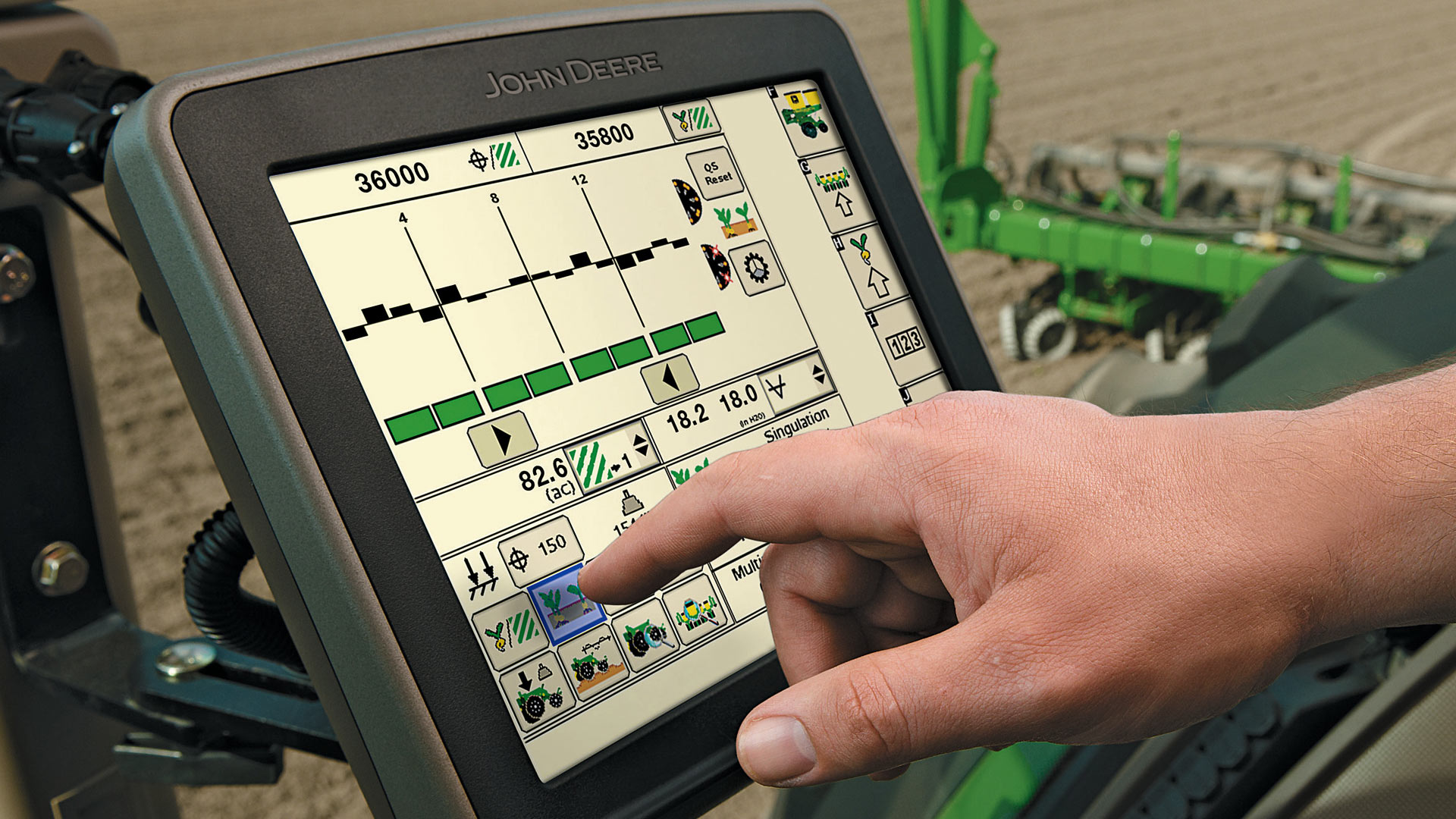 data management hand at display screen 