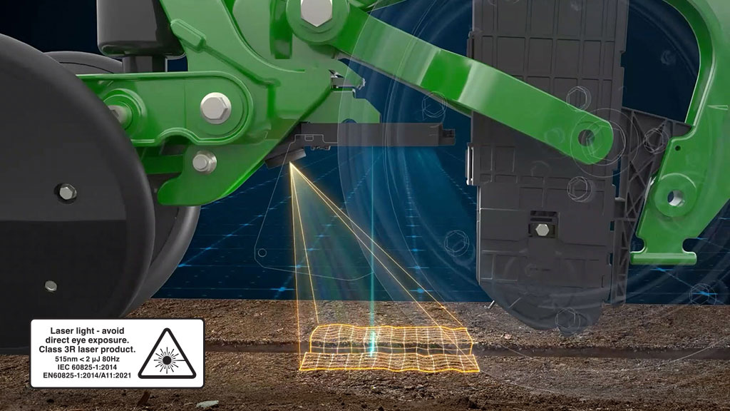 Illustrated John Deere planter row unit projecting a laser onto a soil furrow, with a glowing orange grid overlay representing FurrowVision scanning technology. Illustrated John Deere planter row unit projecting a laser onto a soil furrow, with a glowing orange grid overlay representing FurrowVision scanning technology.