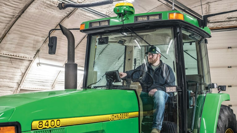 Man in 8400 Tractor