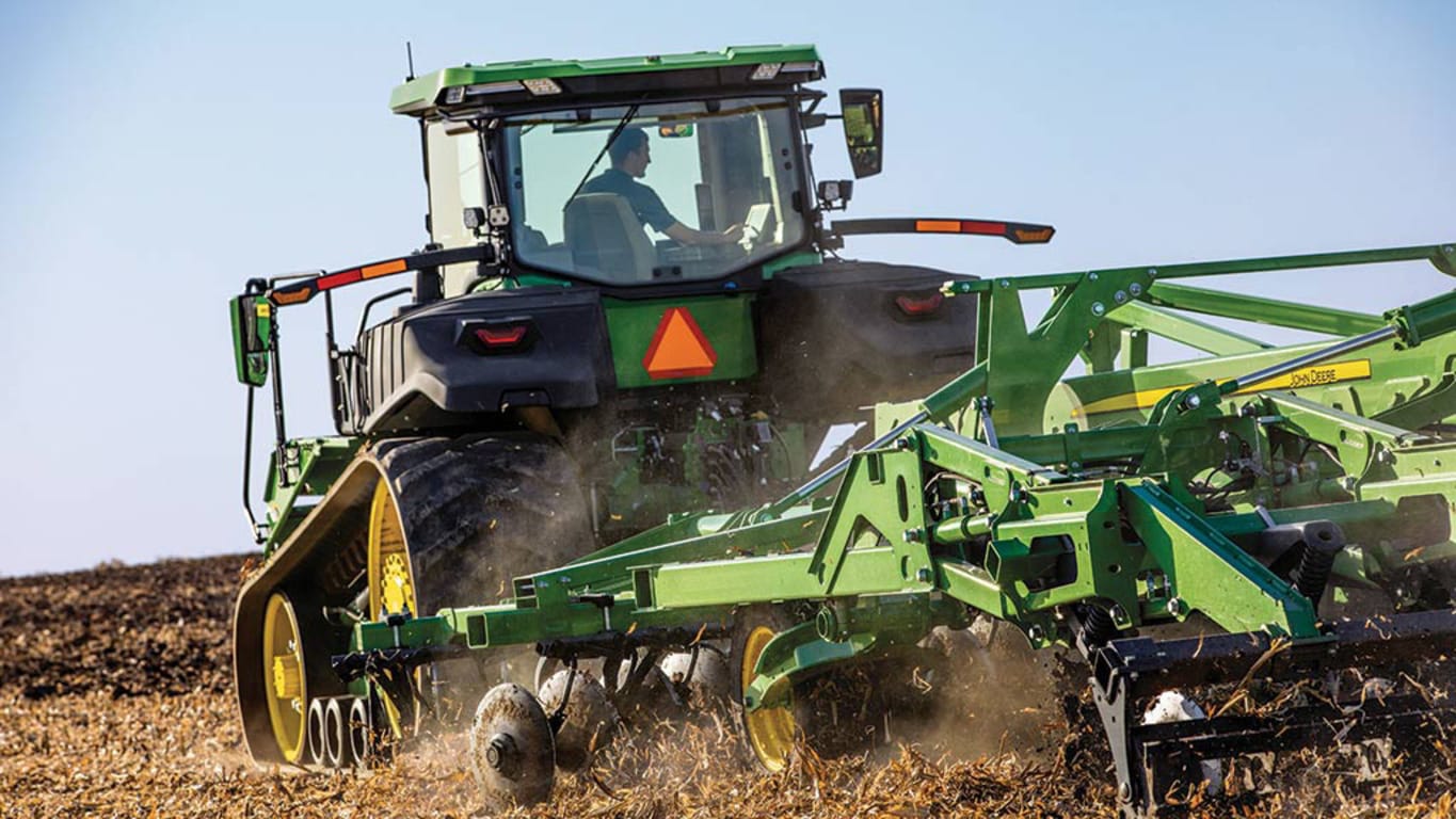 Image of a 9RT 590 Tractor tilling a field