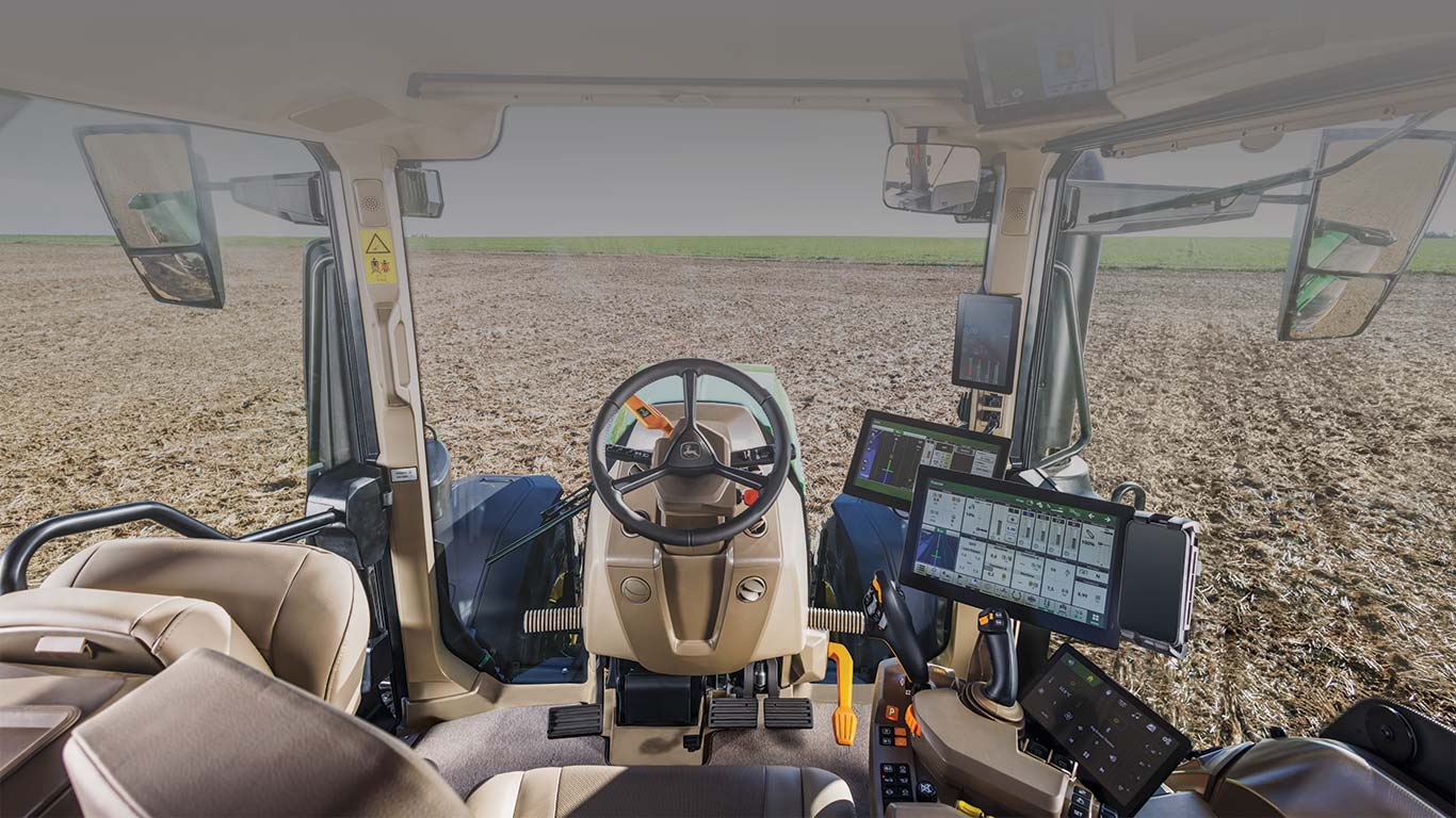 6R cab inside with steering column, seats and display screens