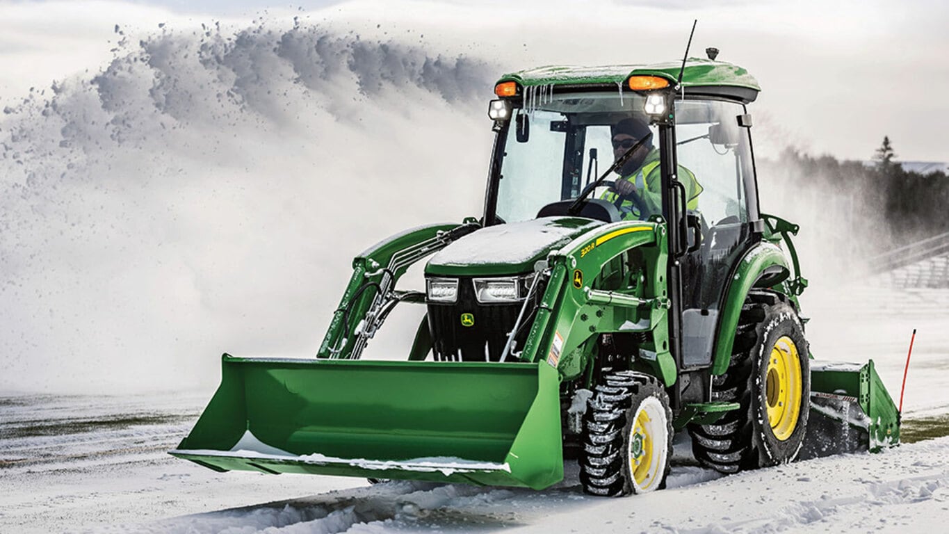 person operating a 3046r removing snow