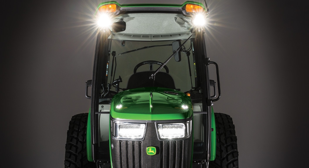 Low light of the 4075R Compact Utility Tractor with LED lights on