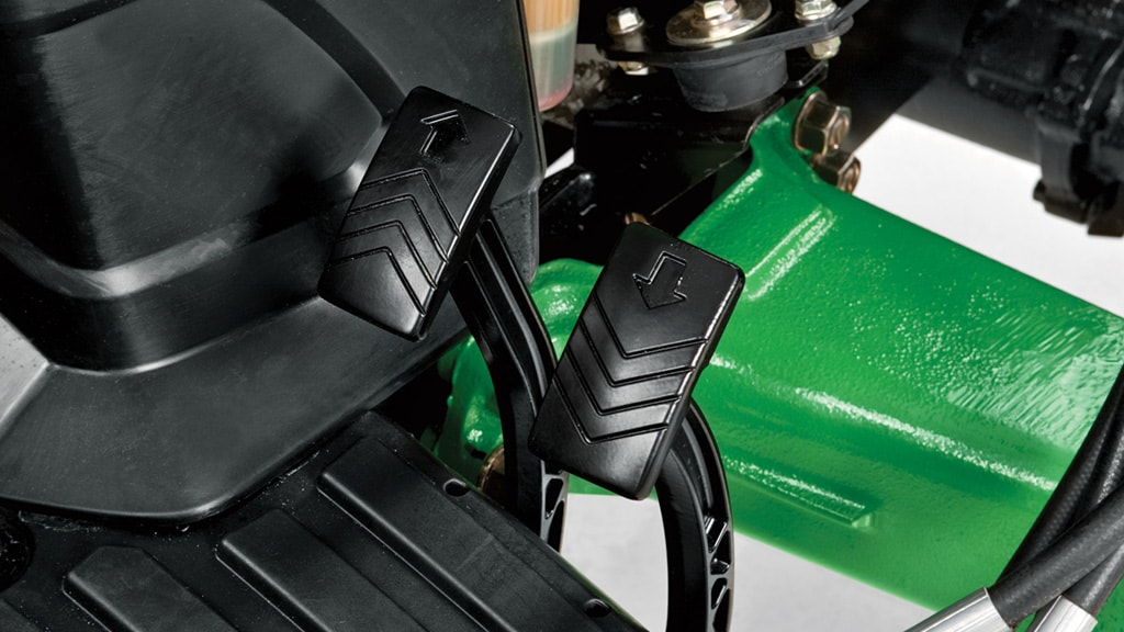Closeup of Twin Touch™ pedals on tractor