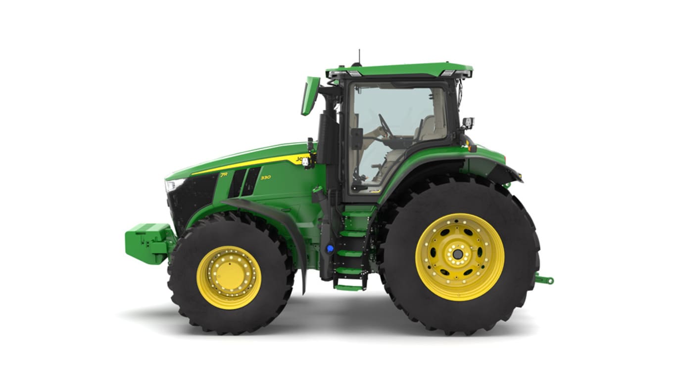 Left facing 7R 330 tractor on a white background