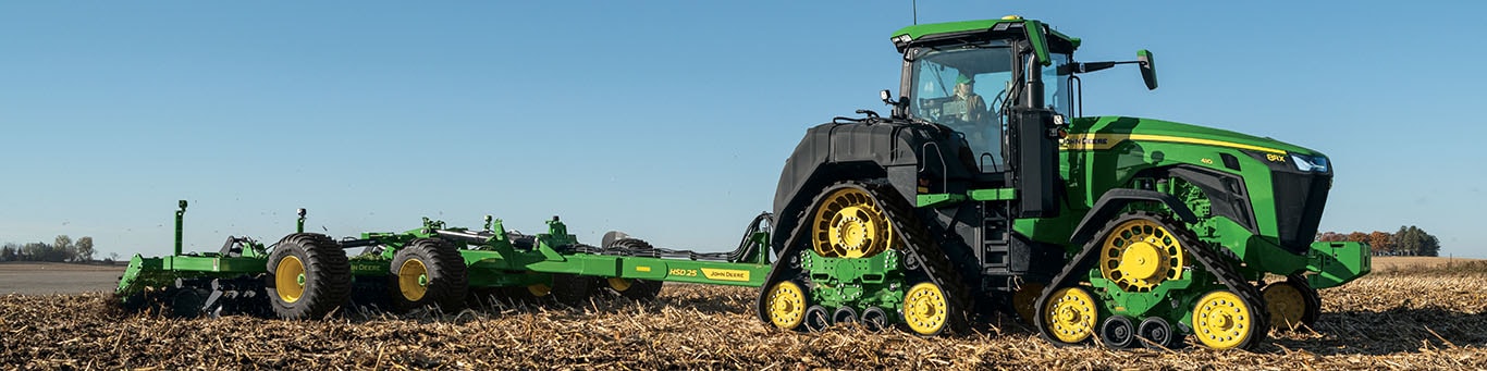 8RX tilling the field with an HSD 25 High-Speed Disk.