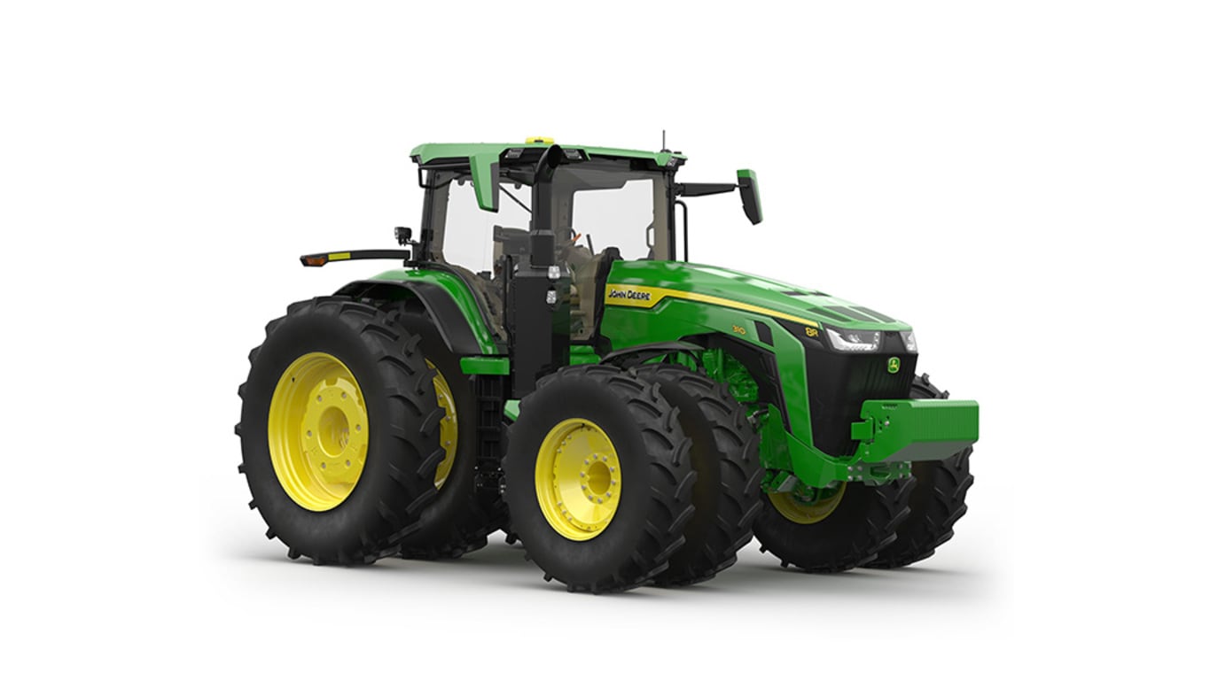 Front-right-facing studio shot of a 16-wheeled green tractor on a white background.