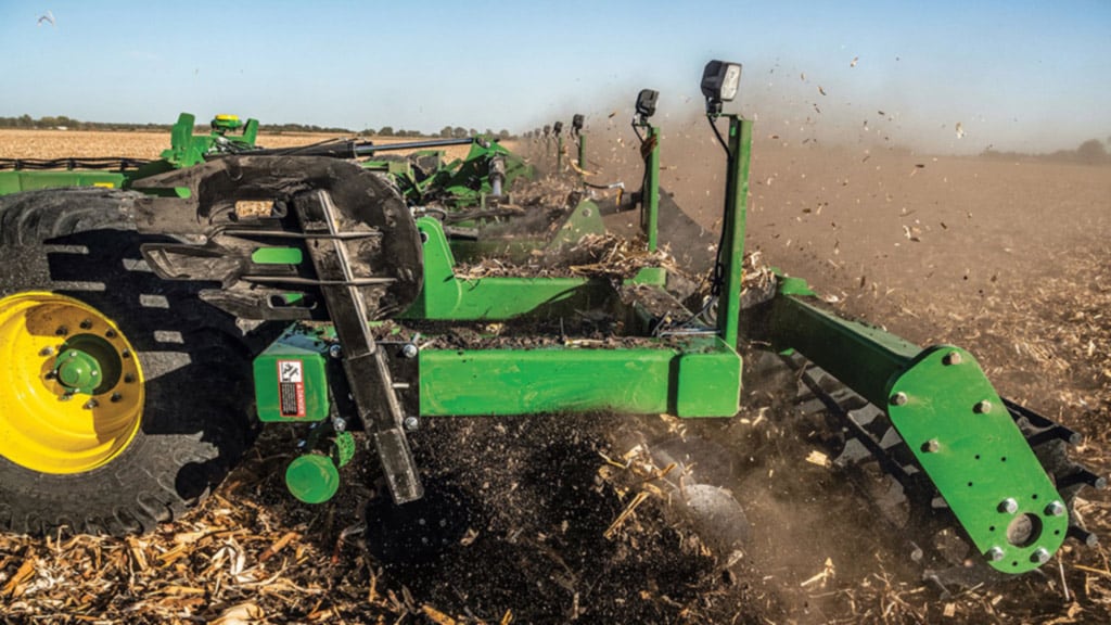 Close-up view of tilling a field. Close-up view of tilling a field.