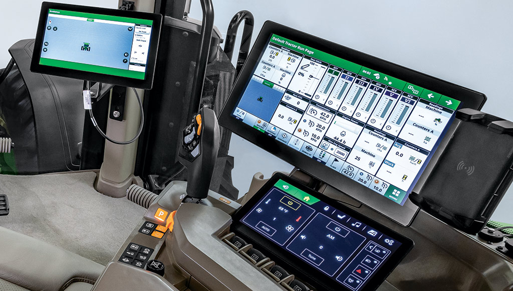 In-cab view of multiple displays showing different information.