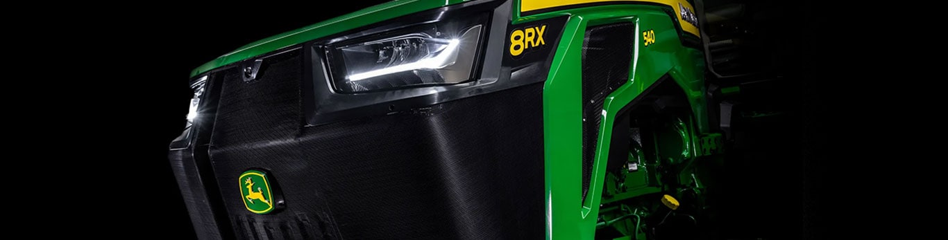 Close up view of 8RX 540 Tractor hood and decal.