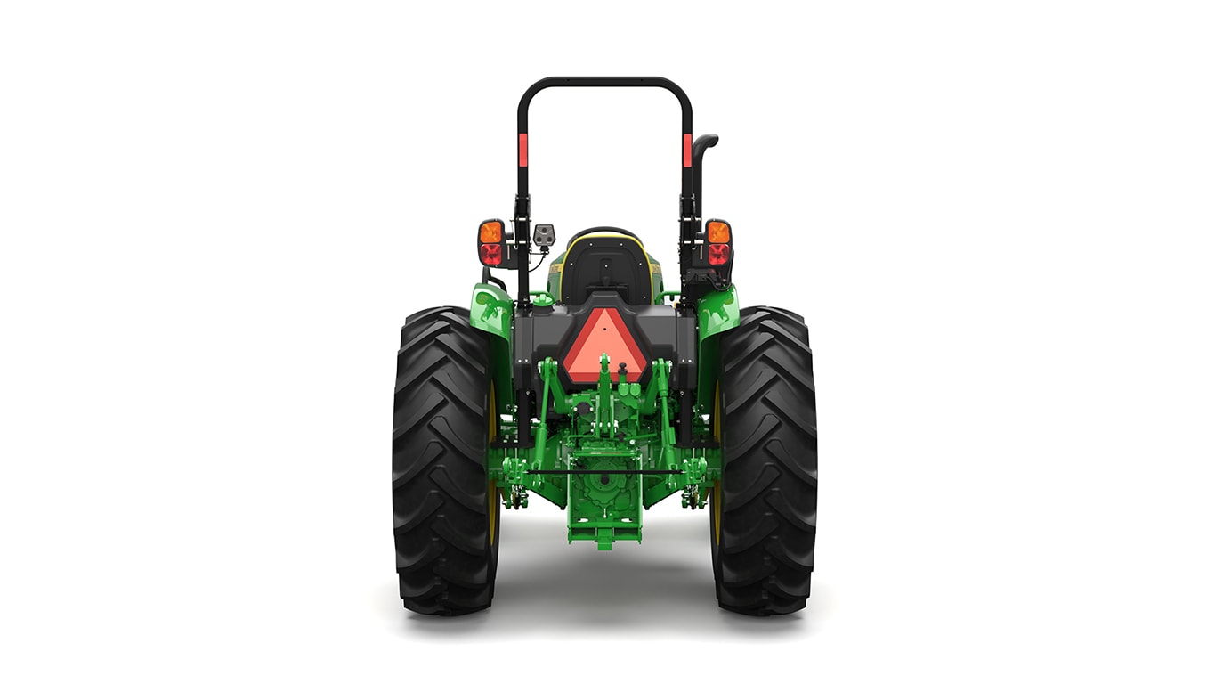 A rear-facing green utility tractor on a white background.