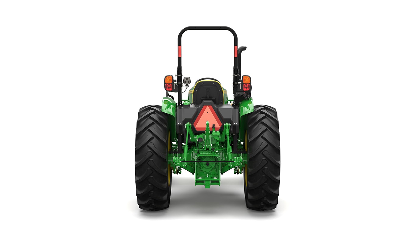 A rear-facing green utility tractor on a white background.