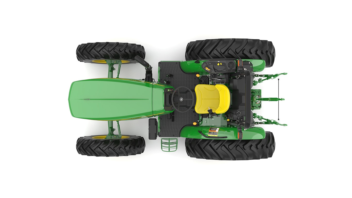 A top-facing green utility tractor on a white background.