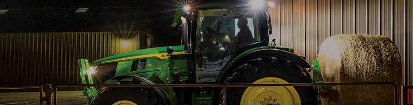 6r tractor at night