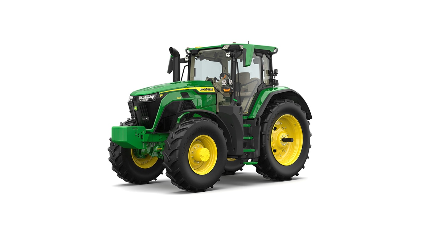 Front-left-facing studio shot of a green 6R 220 utility tractor on a white background.
