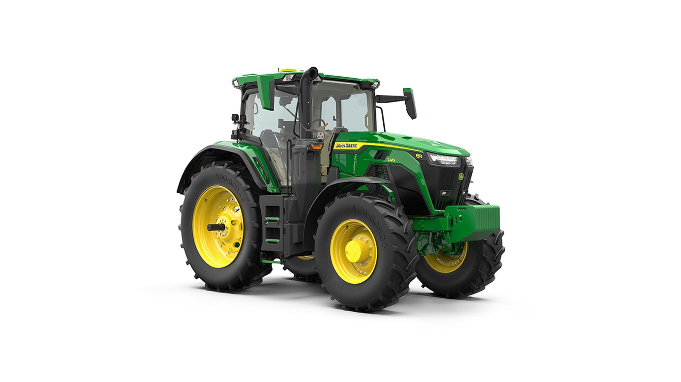Studio shot of a front-right-facing cabbed green tractor on a white background.